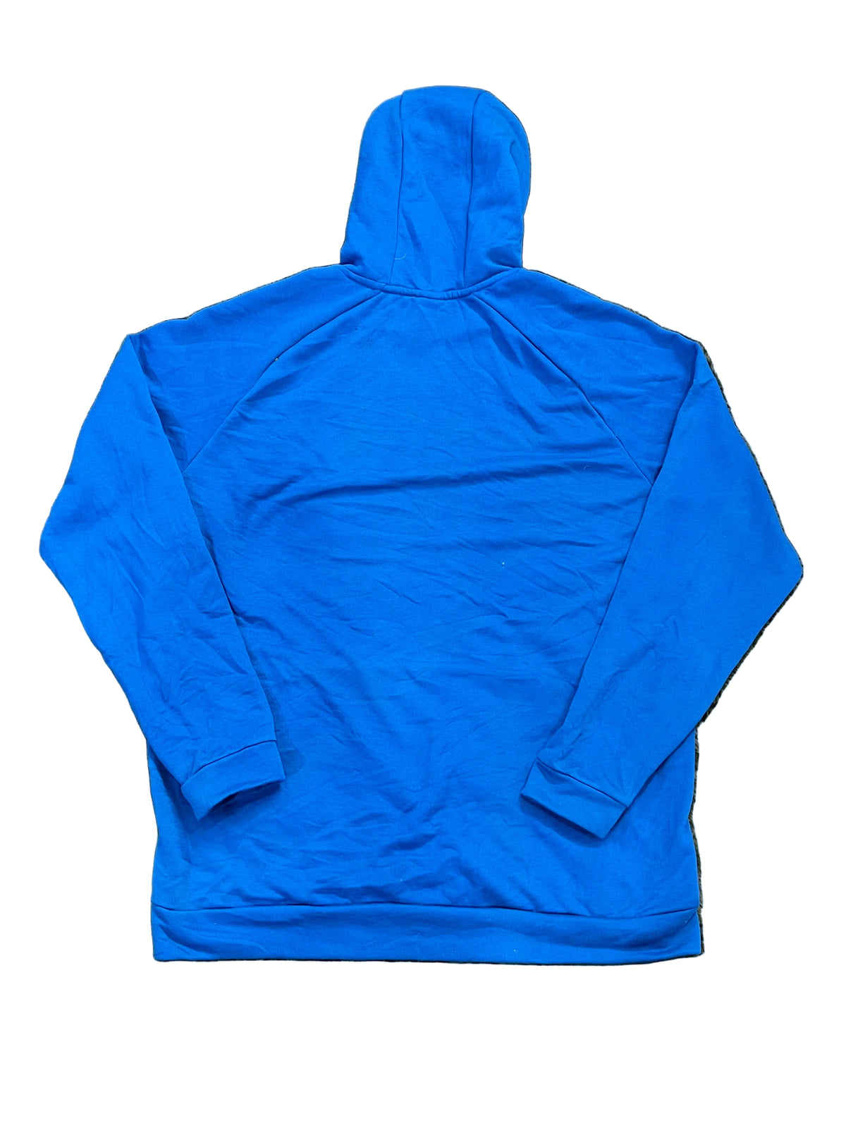 A bright blue long-sleeve hooded sweatshirt, showing the back view. A folded light purple garment is partially visible in the top-left corner.