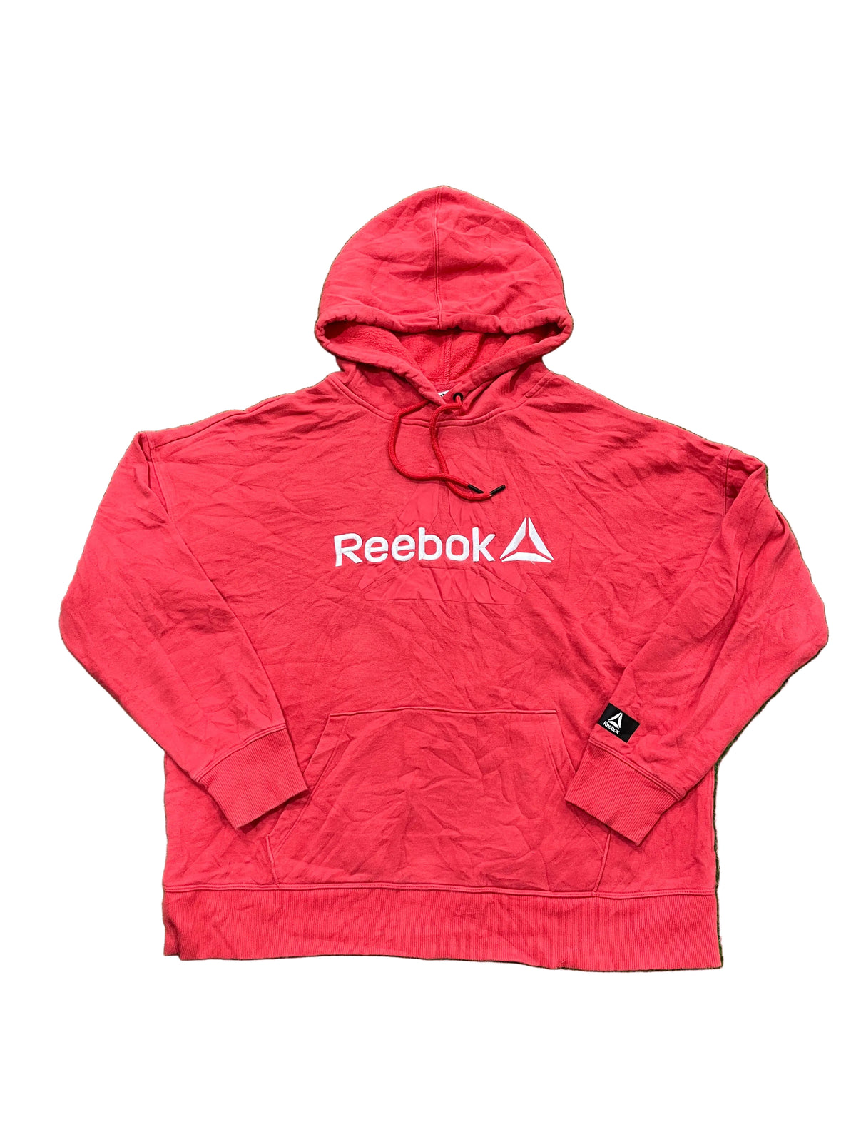A red Reebok pullover hoodie with a white printed logo on the chest,