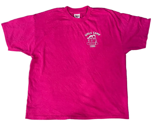 A bright pink short-sleeve t-shirt . The shirt features a small white graphic on the left chest with the text 'GIRLS CAMP 1993' and an illustration of three girls.