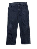 Dark wash blue denim jeans on the white background