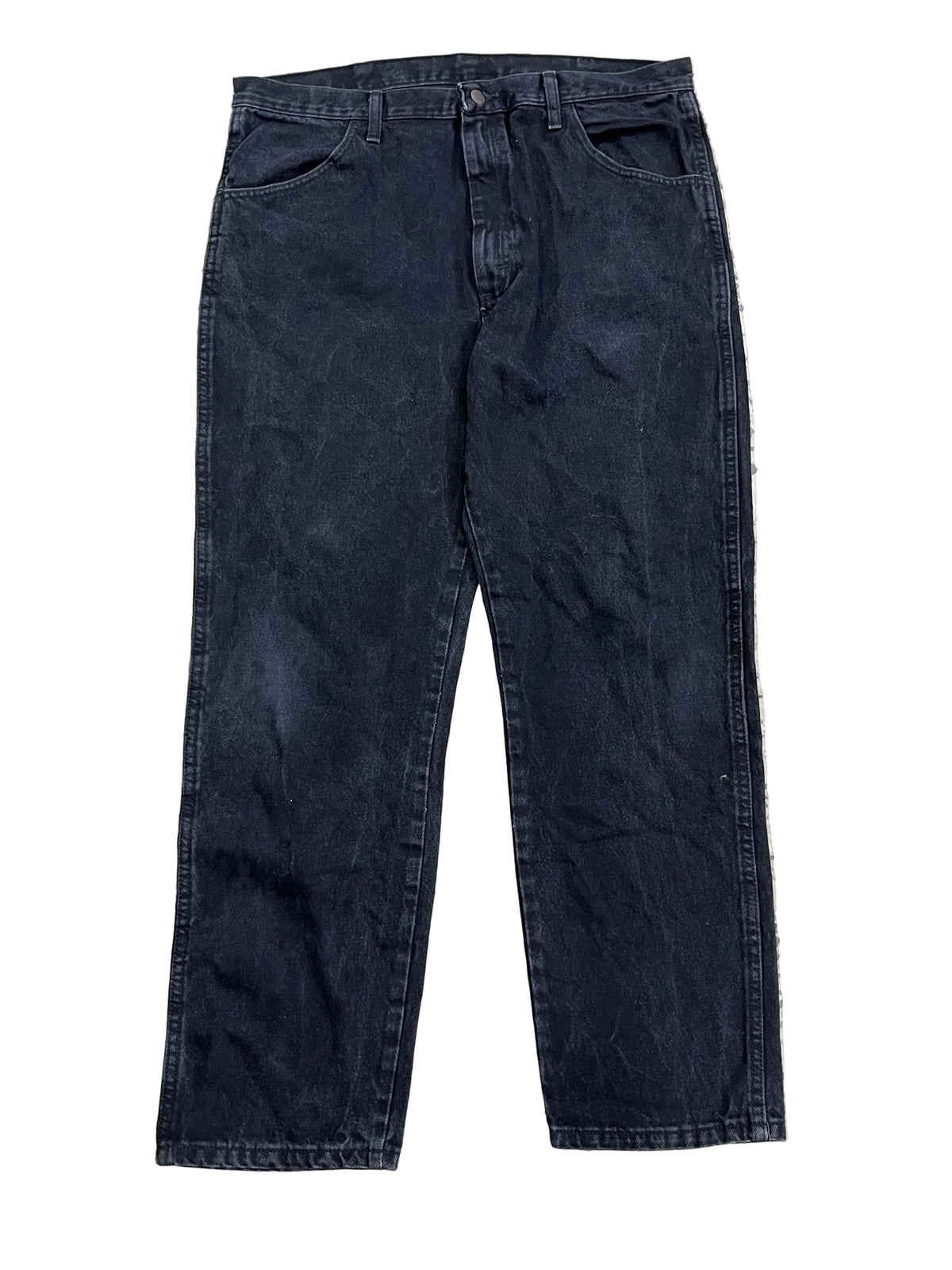Dark wash blue denim jeans on the white background