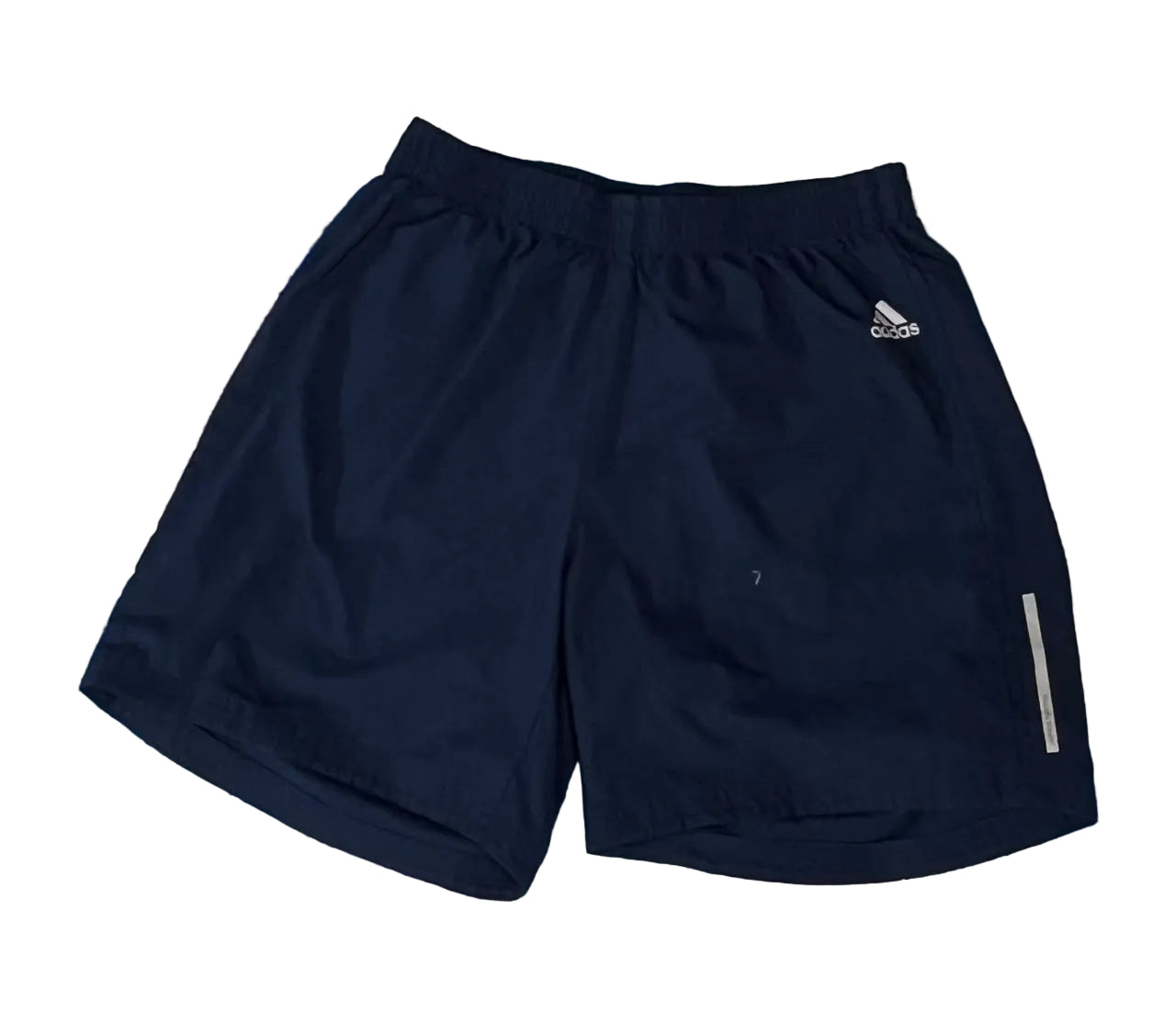 A pair of navy blue Adidas athletic shorts with a small white logo on the left hip and a reflective strip on the lower right leg,