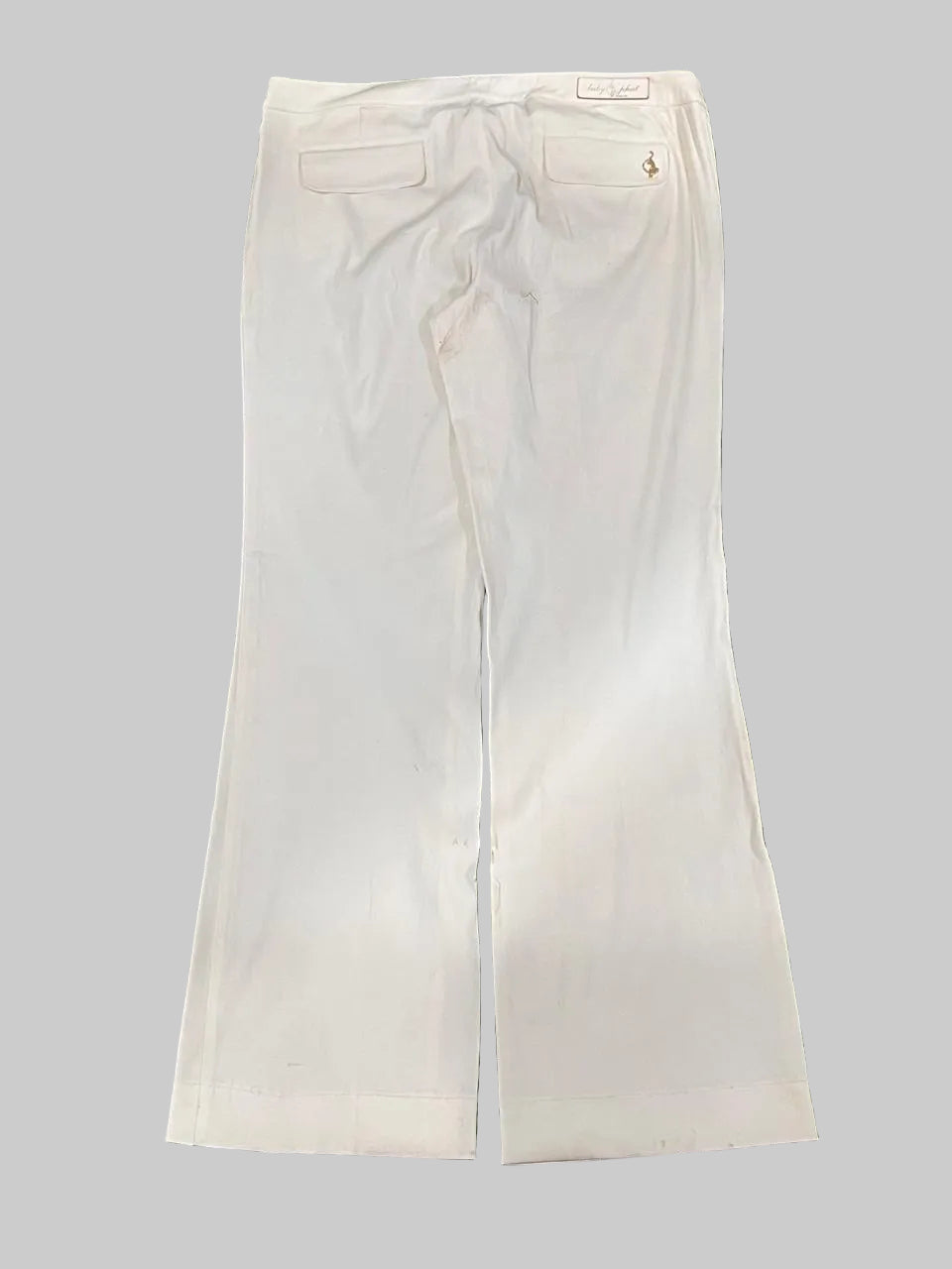 BABY PHAT white pants on a plain white background