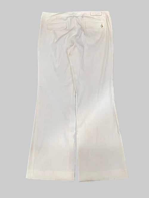 BABY PHAT white pants on a plain white background