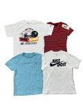 Four kids' short-sleeve t-shirts: a white graphic t-shirt with Arizona football details, a red and navy striped t-shirt, a light blue crewneck t-shirt, and a white Nike 'Just Do It' t-shirt.