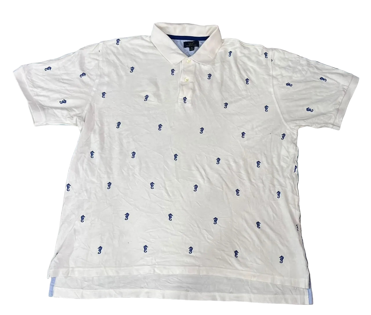 A white short-sleeve polo shirt with a repeating small navy blue embroidered logo pattern