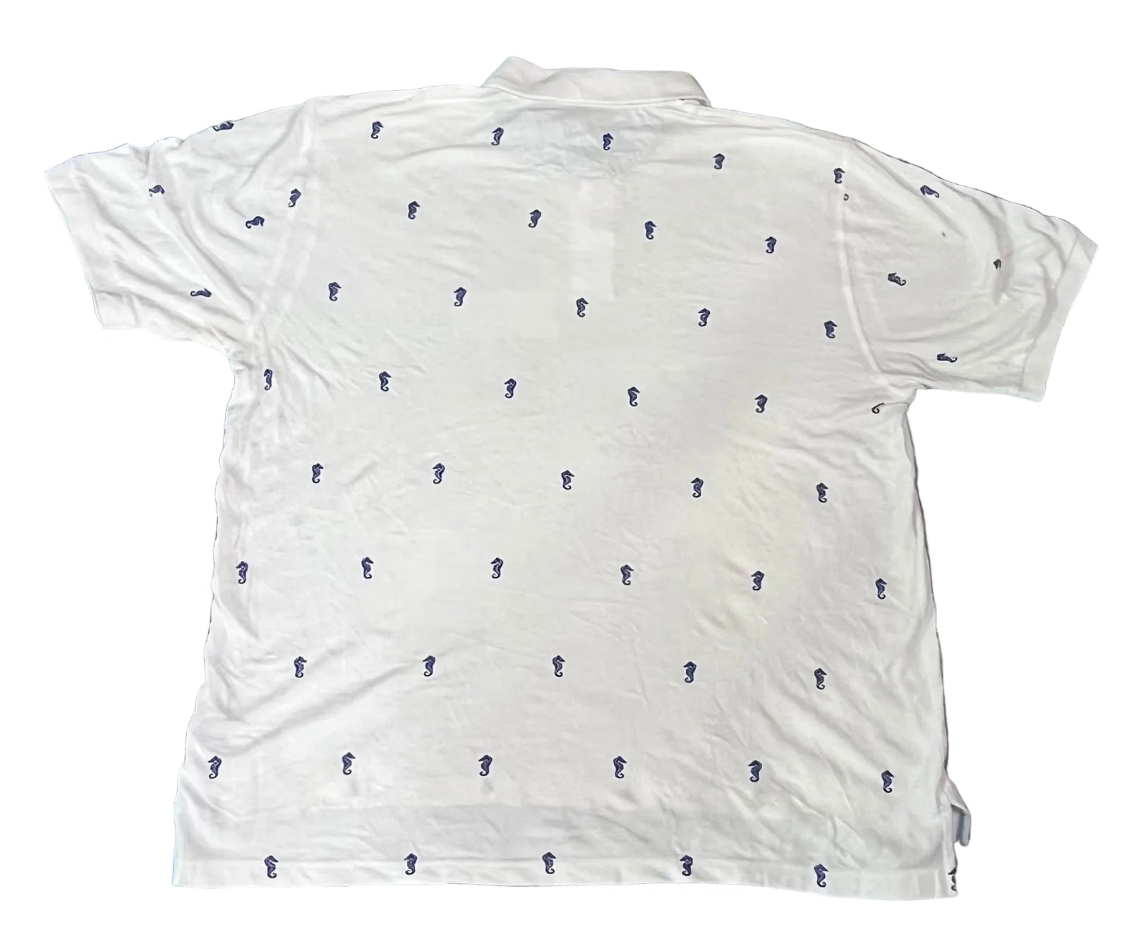 A white short-sleeve polo shirt with a repeating small dark blue embroidered logo pattern