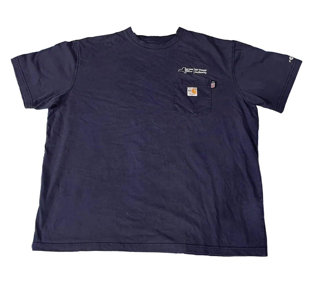 A dark navy blue short-sleeve crewneck t-shirt with a chest pocket, featuring a small white script logo on the left chest and a classic Carhartt brand patch on the pocket