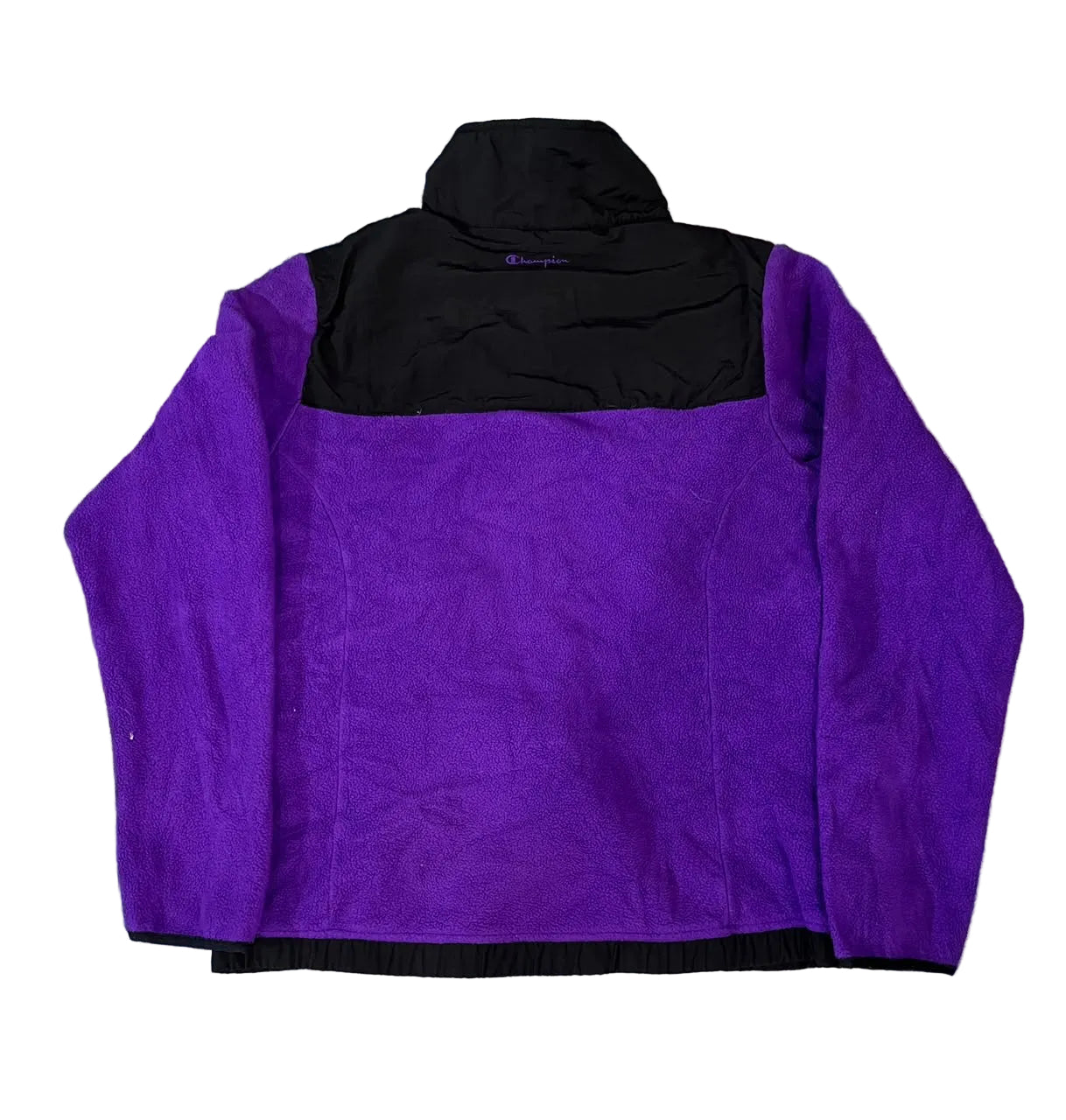 A purple and black zip-up fleece jacket  The jacket features a solid purple body, a black yoke at the shoulders, and a black ribbed hem.