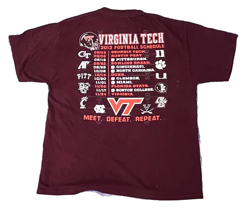 A maroon short-sleeve t-shirt featuring the back with a detailed Virginia Tech 2012 football schedule graphic in red and white, 