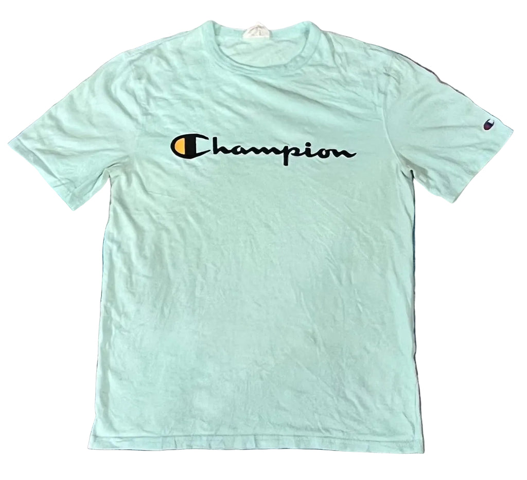A light mint green Champion t-shirt with the brand's signature 'C' logo and 'Champion' script across the chest, 