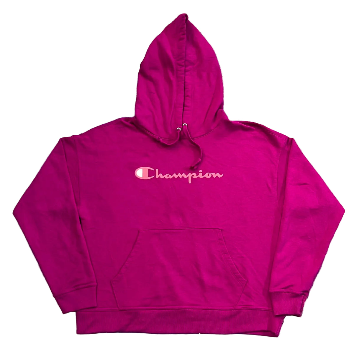 A bright magenta pink Champion hoodie with the brand name embroidered in white across the chest,