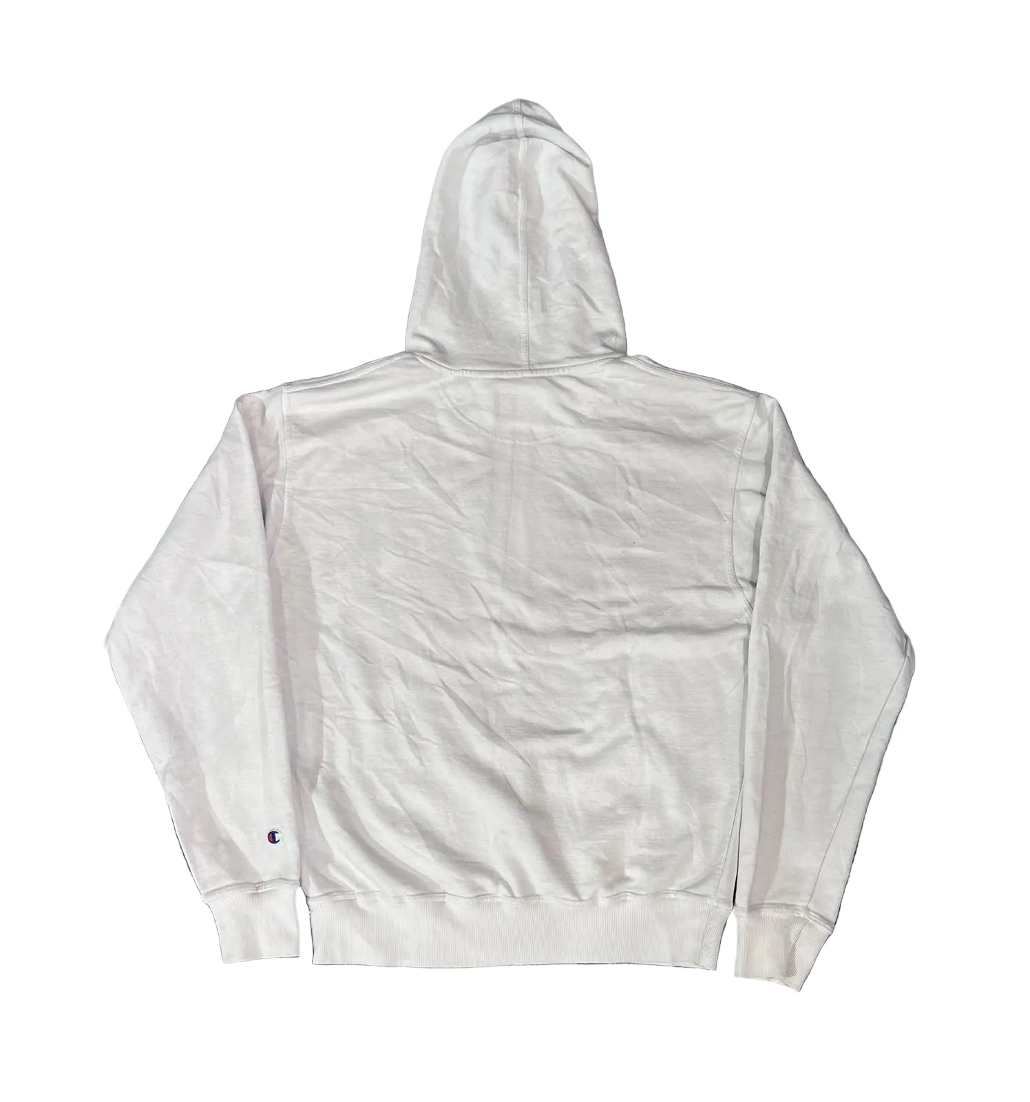 A white hooded sweatshirt The back of the hoodie is shown, featuring a small embroidered Champion 'C' logo on the left sleeve cuff.