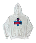 A white pullover hoodie with a 'New York State' graphic printed on the chest, A person's bare foot is visible in the bottom right corner.
