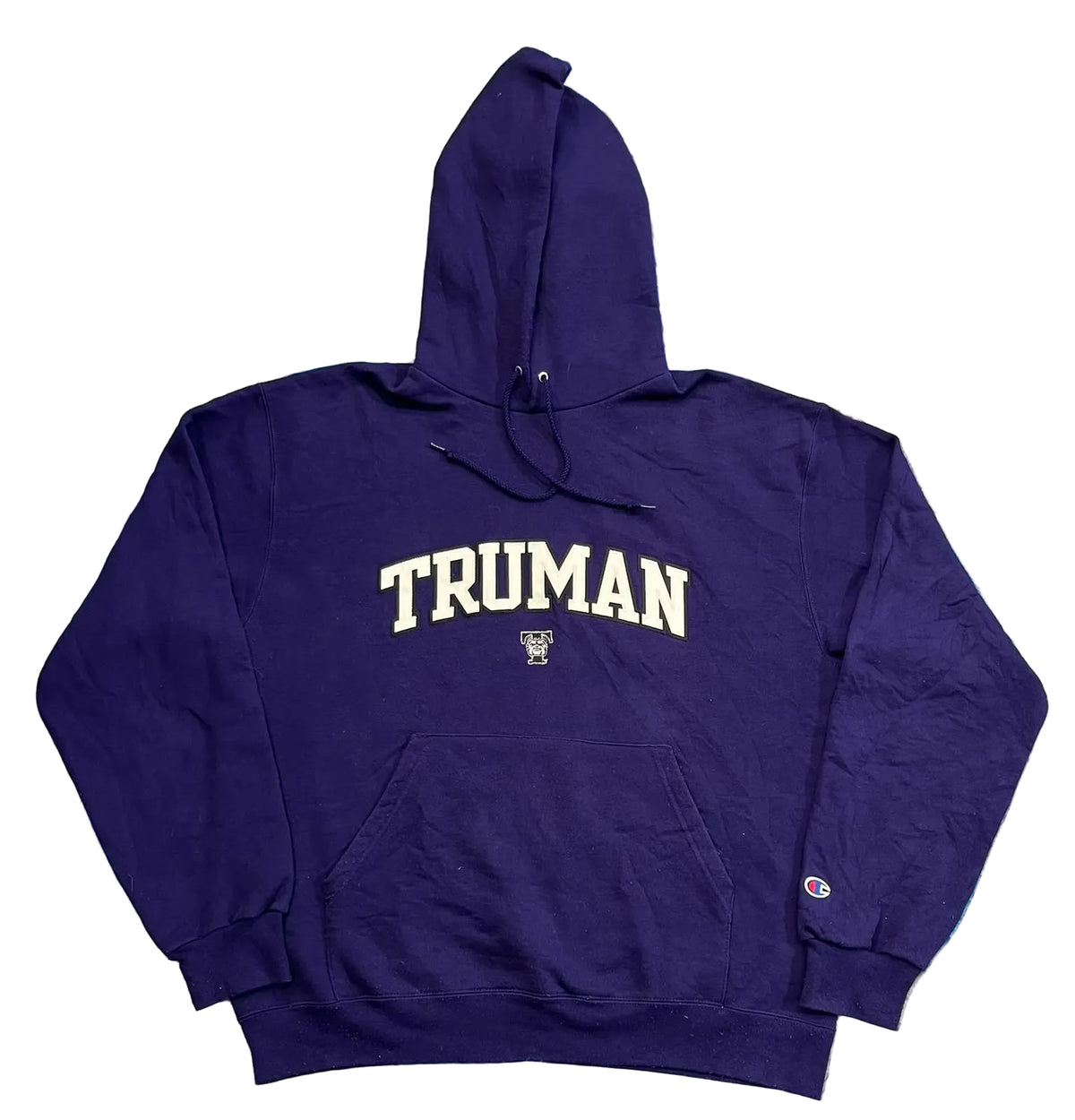 A dark purple Champion hoodie with 'TRUMAN' printed in white varsity letters across the chest, 