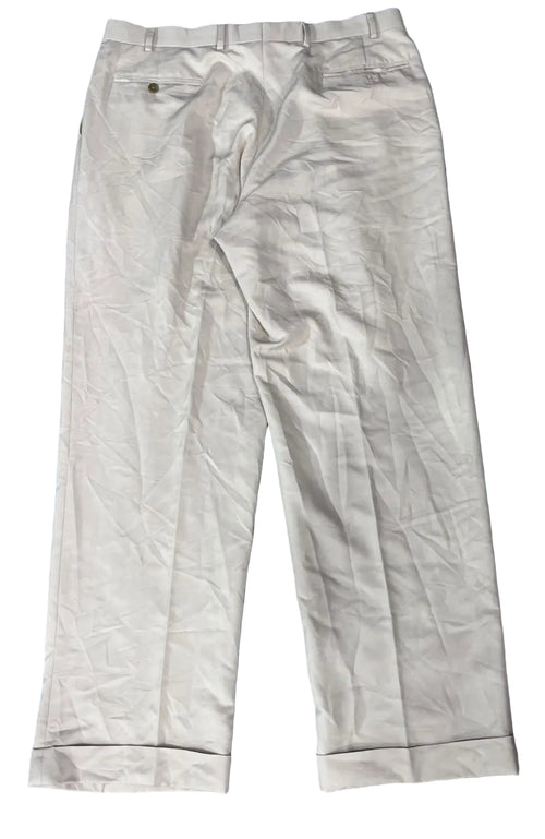 A pair of light beige or off-white chino pants CHAPS
