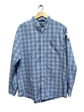 CHAPS Blue plaid shirt on a hanger against a white gray wall