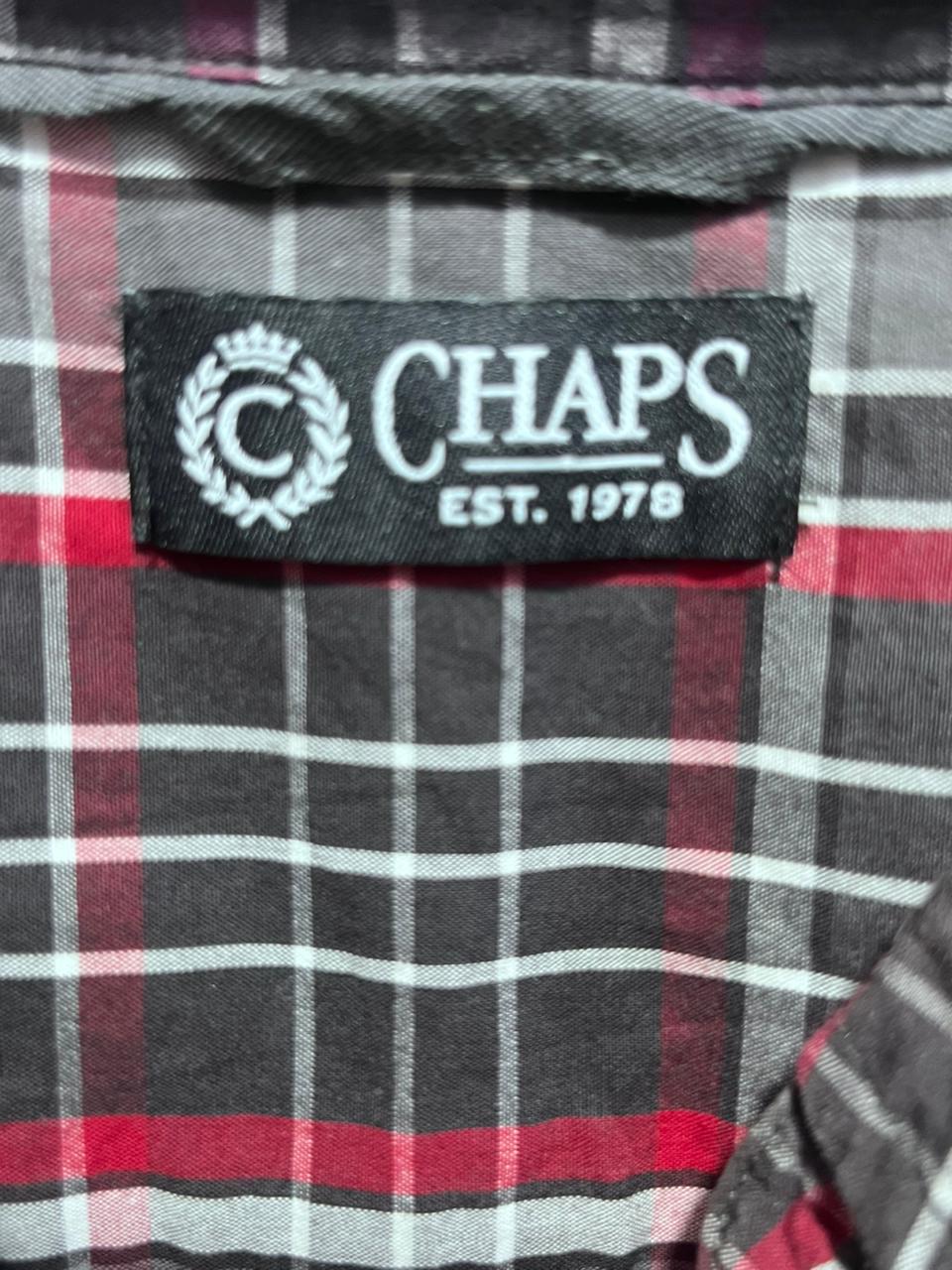 Chaps label on a plaid shirt with red, gray, and white pattern