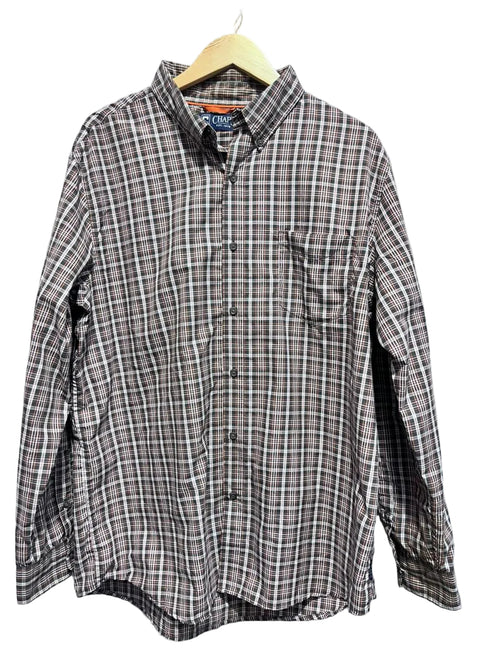 Chaps Men shirt on a hanger against a white wall