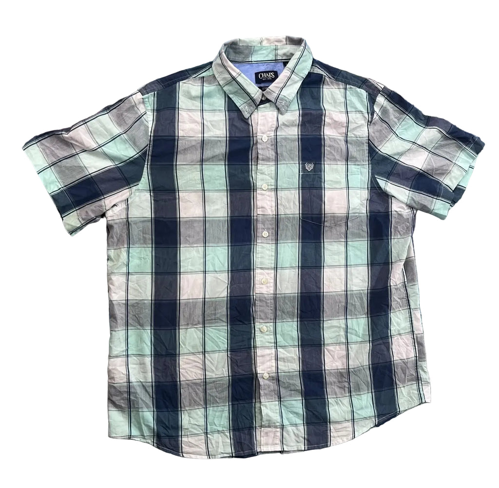 A short-sleeve plaid button-up shirt . The shirt features a pattern of black, gray, and light mint green plaid with thin white lines.