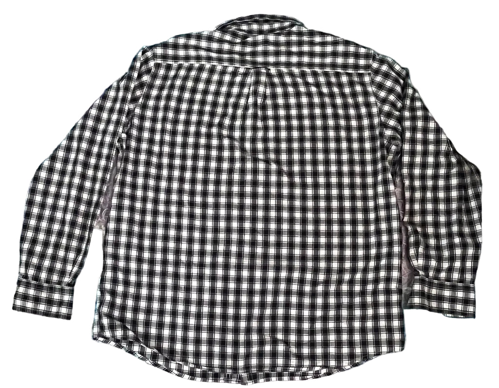 A long-sleeve black and white checkered plaid button-up shirt 