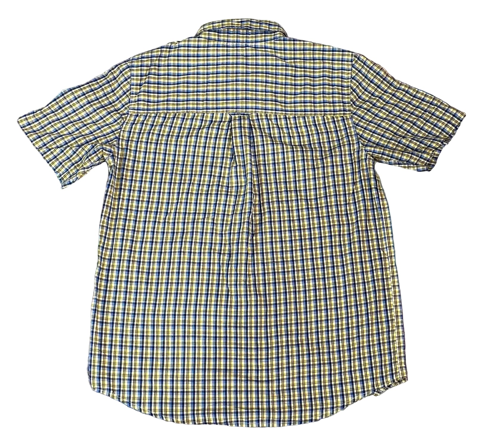 A short-sleeve plaid button-up shirt. The shirt features a yellow, blue, and white checkered pattern.