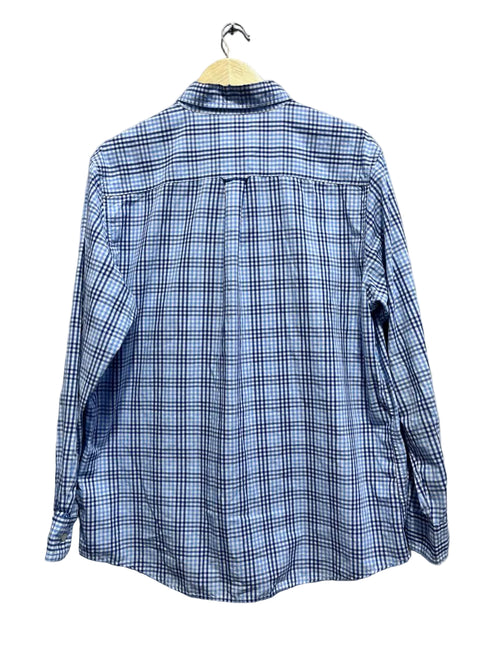 chaps Blue plaid shirt on a hanger against a white wall.