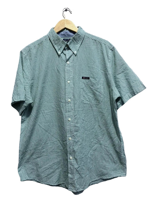 chaps green checkered shirt on a hanger against a gray wall