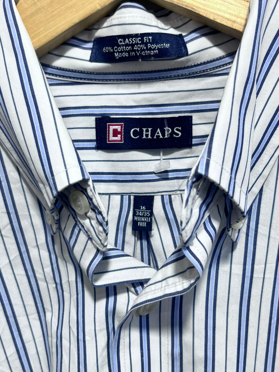 Striped shirt with Chaps label on a hanger