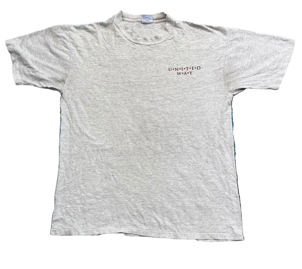 A light heather gray short-sleeve t-shirt with 'UNIFIED WAVE' printed in black on the left chest,