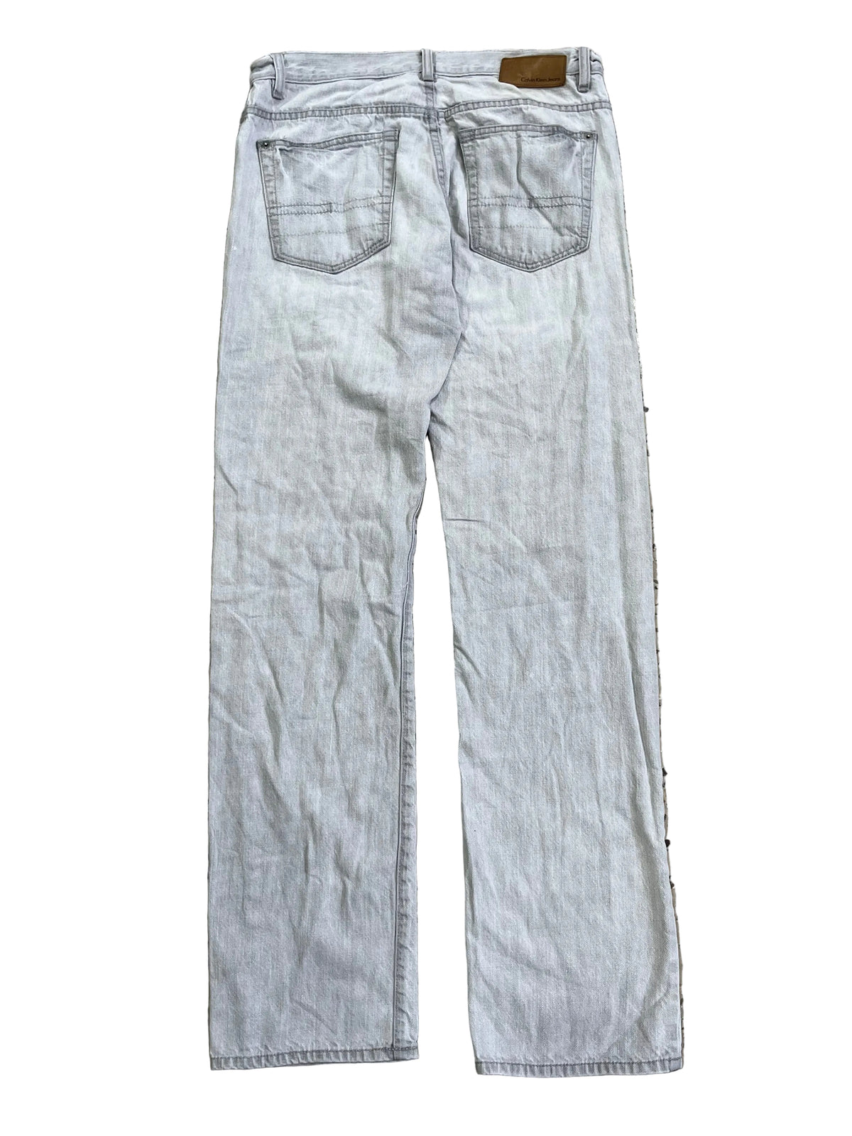 Light-wash blue denim jeans shown from the back,
