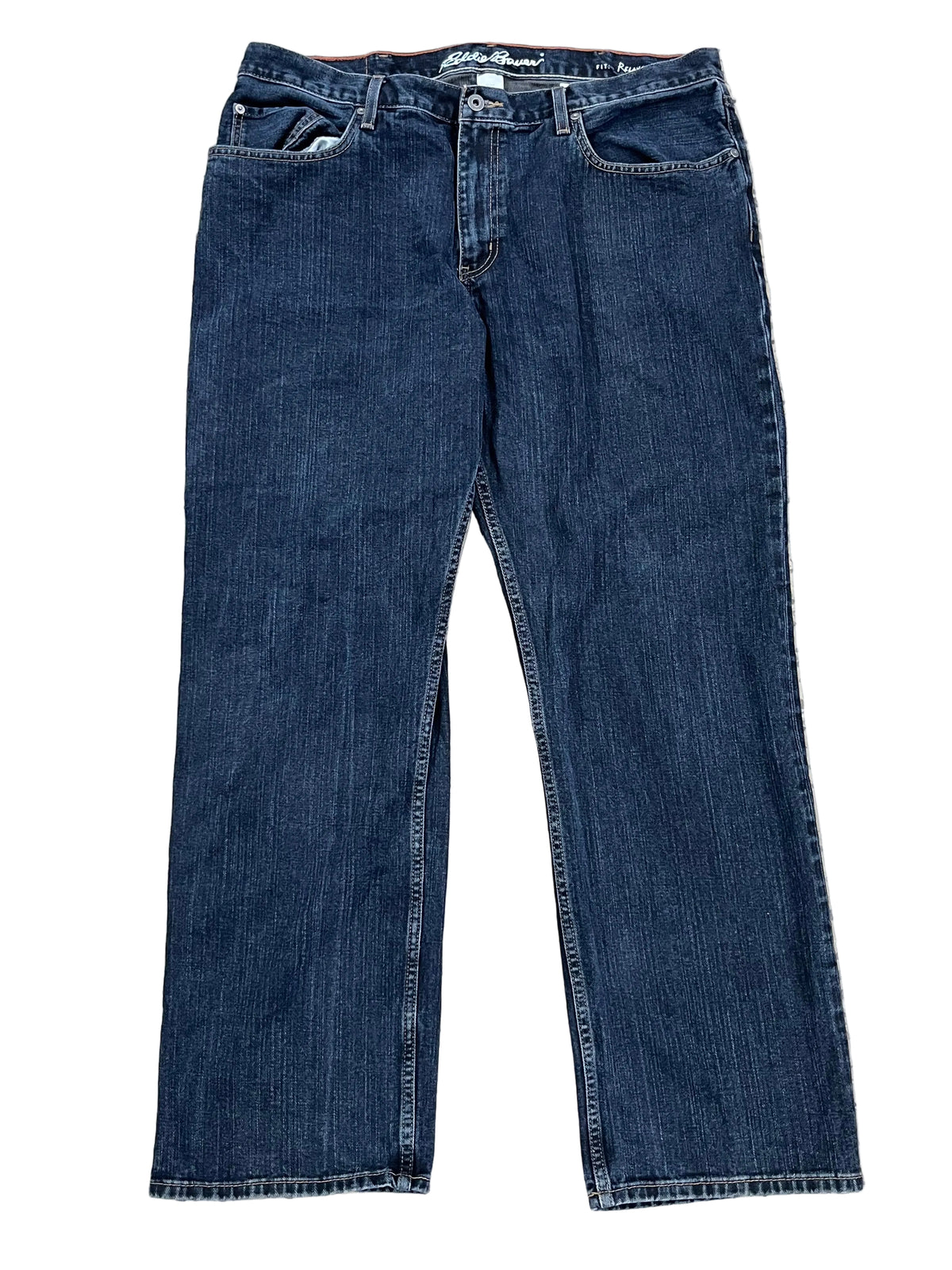 A pair of dark blue denim jeans 