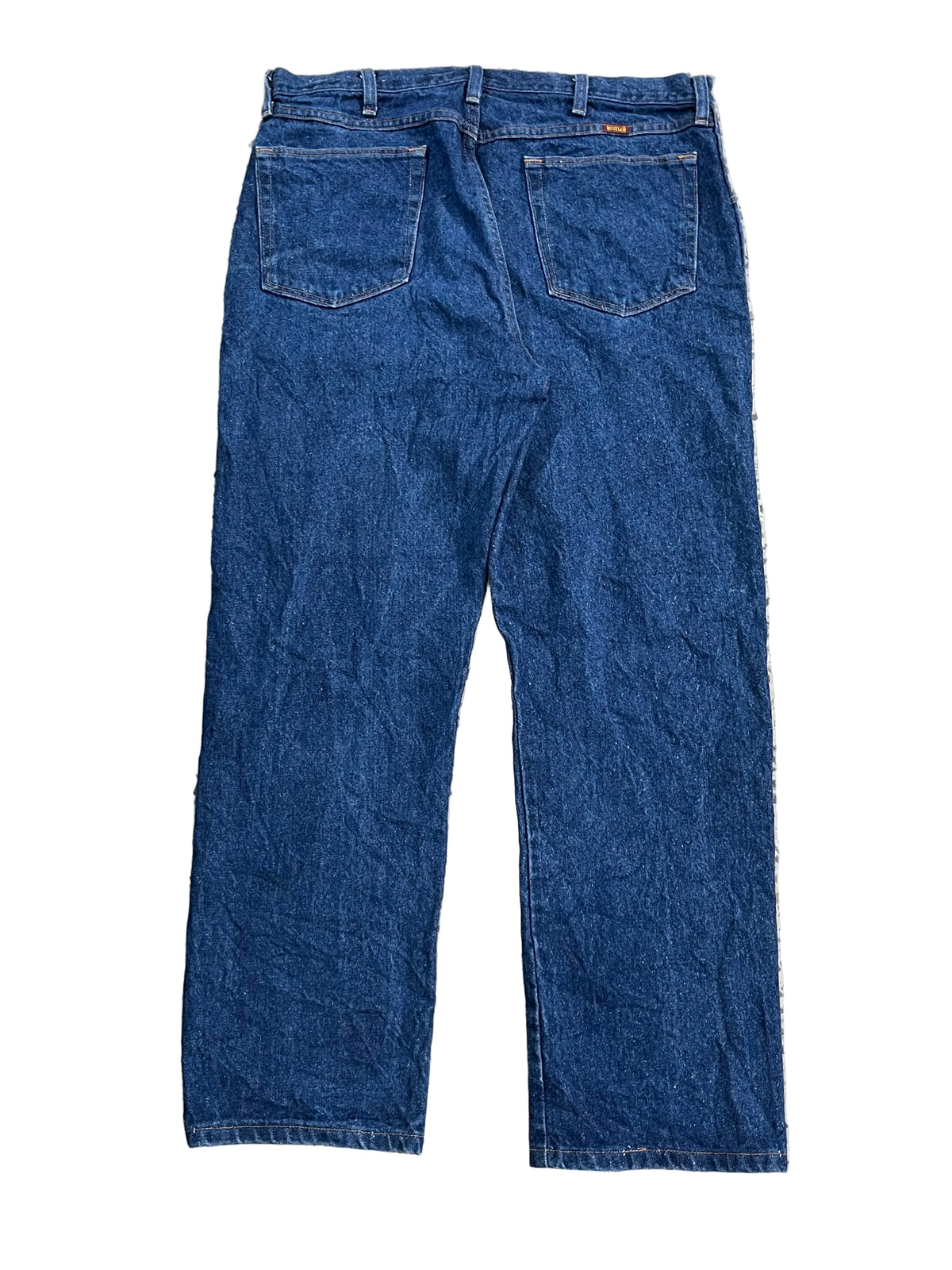 A pair of blue denim jeans shown from the back,ON THE WHITE BACKGROUND