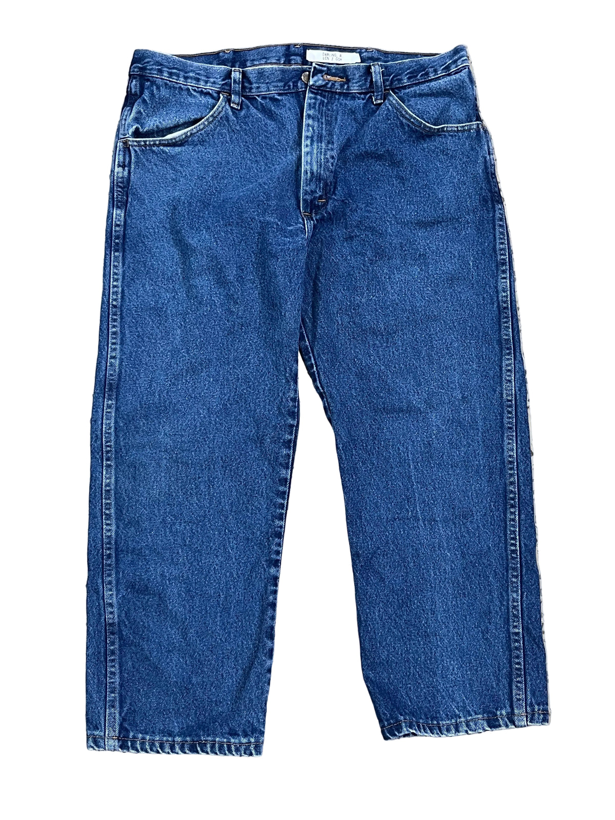 A pair of blue denim jeans ON THE WHITE BACKGROUND