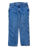 A pair of medium wash blue denim jeans ON THE WHITE BACKGROUND