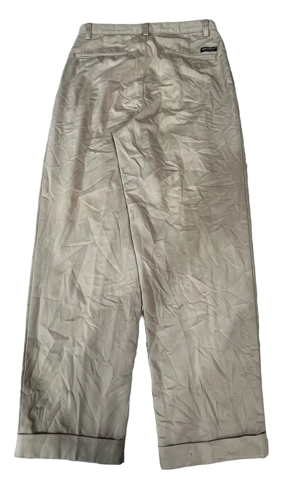 A pair of beige wide-leg trousers, showing the back side with creases.