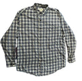 A long-sleeve button-up plaid shirt in black, white, and gray, 