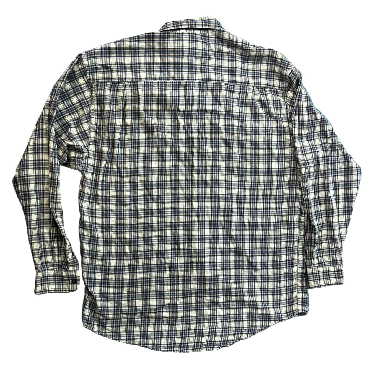 A long-sleeve plaid button-up shirt The shirt features a black, white, and gray plaid pattern.