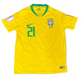 A yellow Brazil national team soccer jersey with green trim, featuring the number 21 on the right chest, a green Nike swoosh, and the Brazil crest on the left chest, 