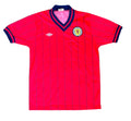 A vintage Scotland football jersey by Umbro, featuring a bright red body with thin vertical navy pinstripes, a navy V-neck collar, and the Scotland crest on the left chest
