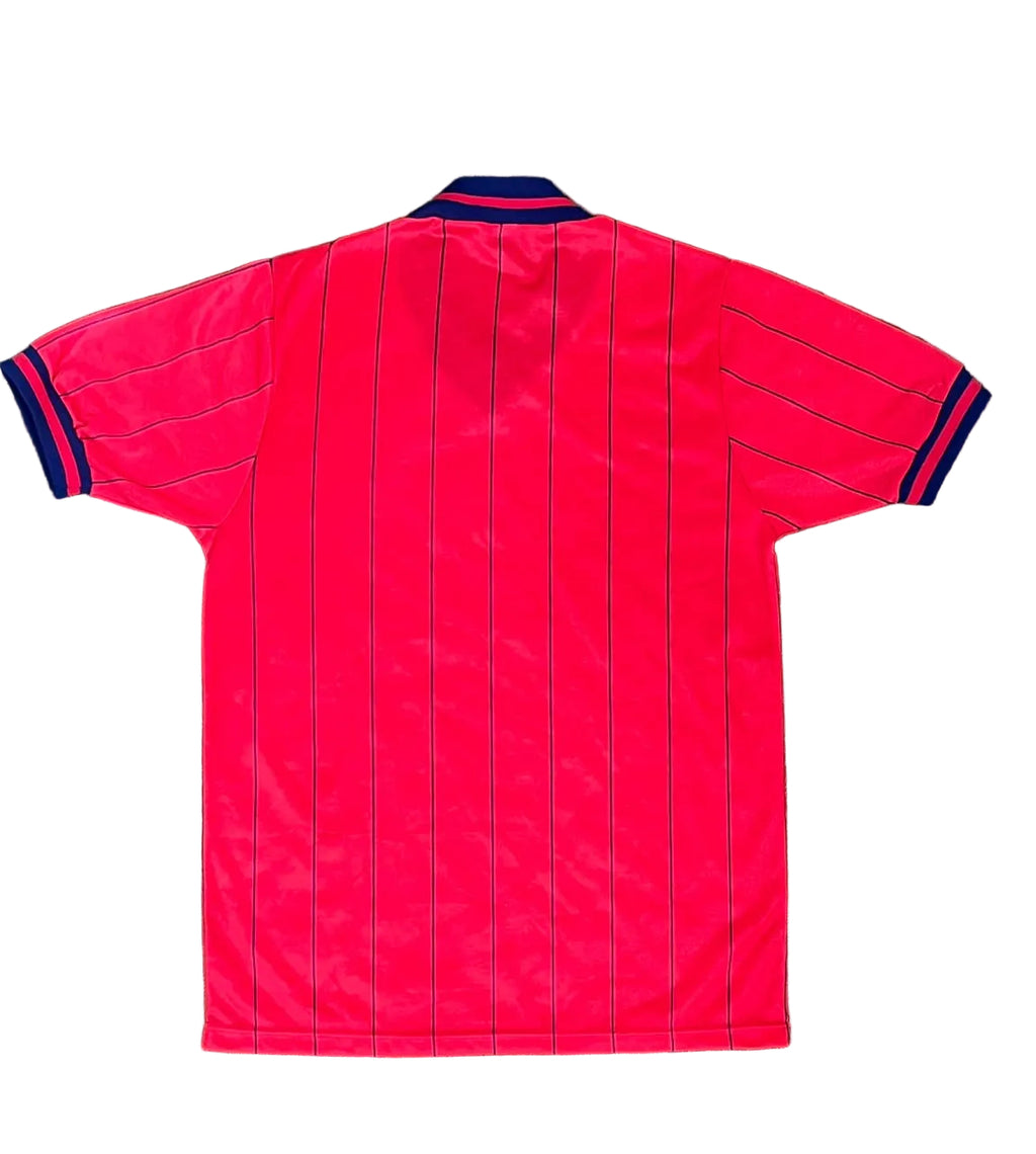 A bright red short-sleeve soccer jersey with thin vertical black pinstripes,The collar and sleeve cuffs feature dark navy blue and red trim.