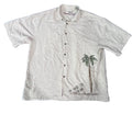 A white short-sleeve button-up shirt with a palm tree graphic on the lower right side The brand 'Romantic Cafe' is printed inside the collar.