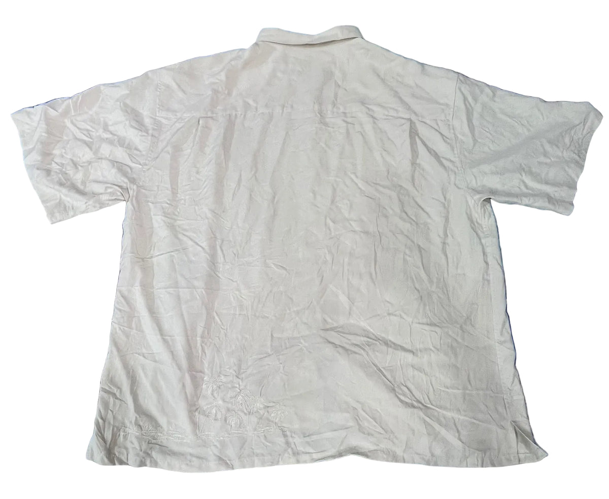 A white short-sleeve button-up shirt ON THE WHITE BACKGROUND
