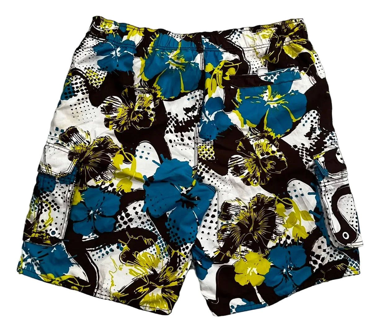 A pair of men's cargo shorts featuring a bold, multicolor abstract floral print with blue, yellow, black, and white patterns, 