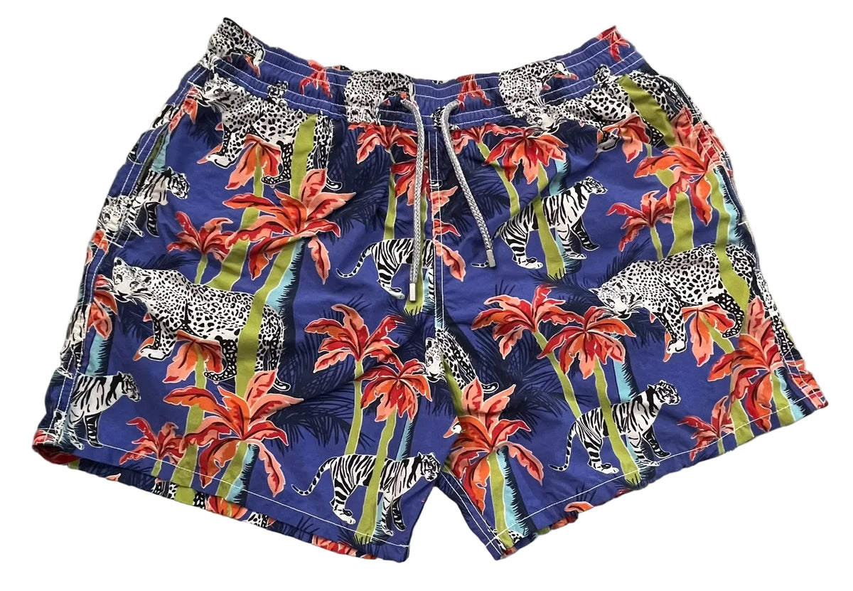 A pair of men's swim trunks featuring a vibrant blue tropical print with palm trees, leopards, zebras, and red flowers, 