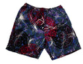 A pair of men's shorts featuring a complex abstract pattern with red, purple, black, and white elements,