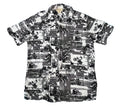 A short-sleeve button-up camp shirt with a black and white patchwork print featuring motorcycles, palm trees, and beach scenes, 