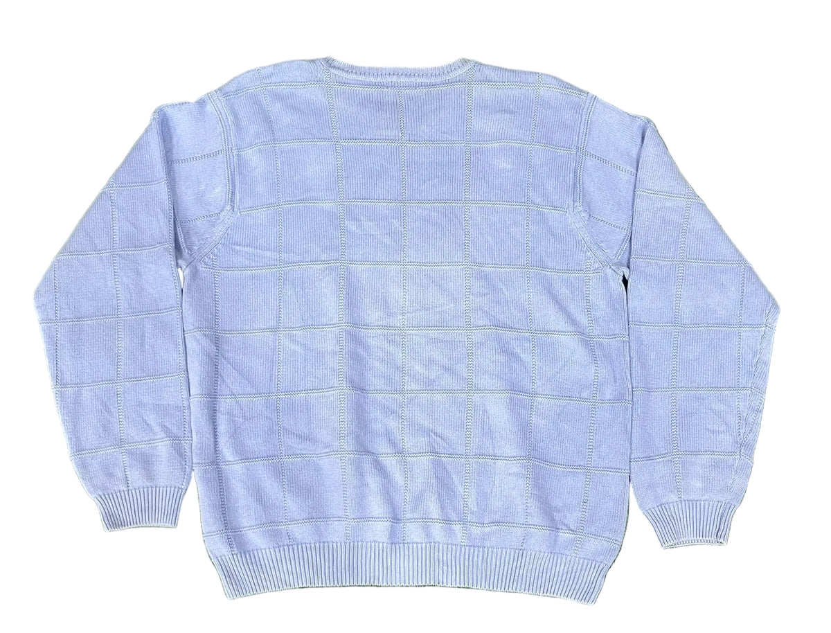 A light blue knit sweater with a subtle grid pattern, 