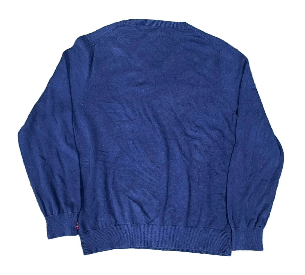 A navy blue long-sleeve knit sweater ON THE WHITE BACKGROUD 