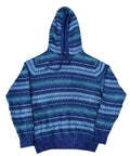 A blue and navy patterned knit hoodie with a Fair Isle style design, 